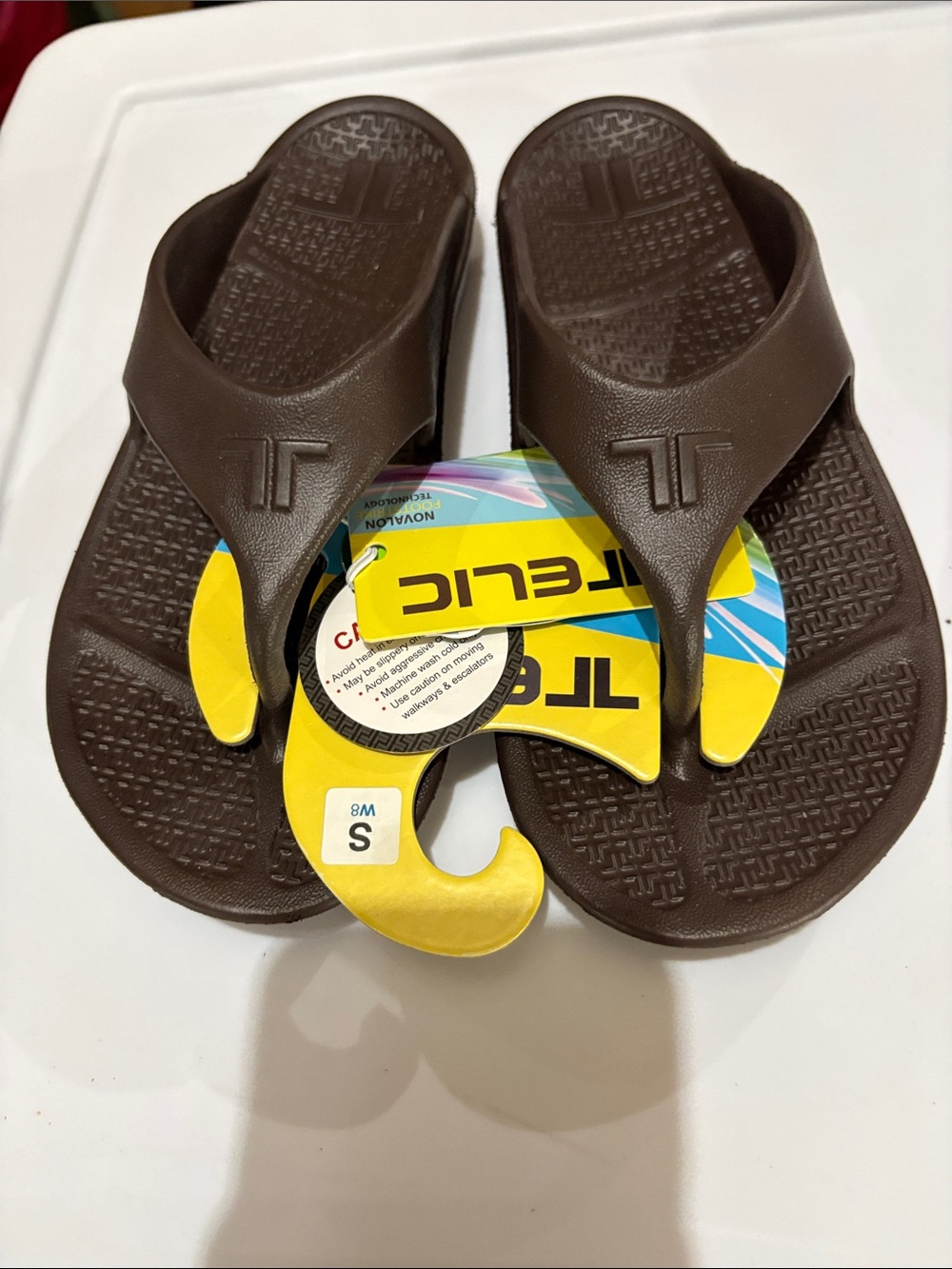 Unisex Rare Telic Flip Flop Never worn Brown Small